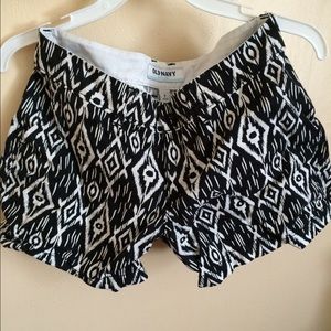 Black and white patterned shorts.