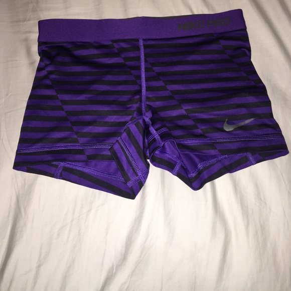 Purple Nike shorts