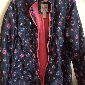 Floral patterned rain jacket.