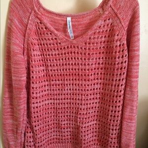 Pink knitted oversized sweater.