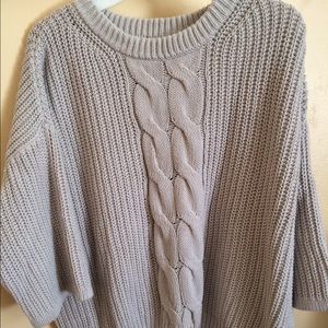 Knitted sweater.
