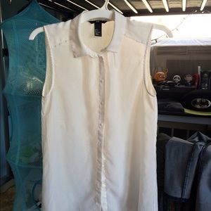 White tanktop blouse.