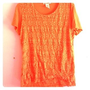 It's An orange top with lace all over the front!