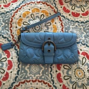 Coach wristlet with signature C pattern