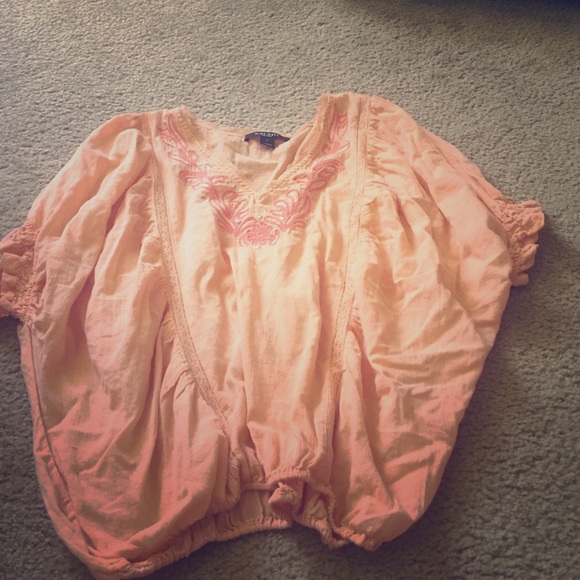 Orange dolman shirt with embroider neck line