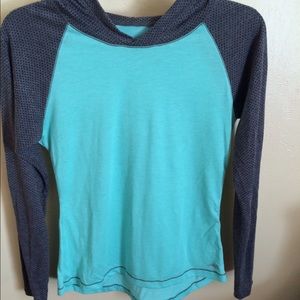 Aqua blue and grey long sleeve shirt.