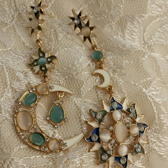 Gold moon and sun earrings