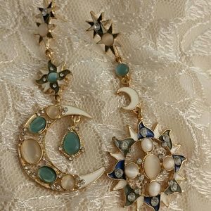 Gold moon and sun earrings