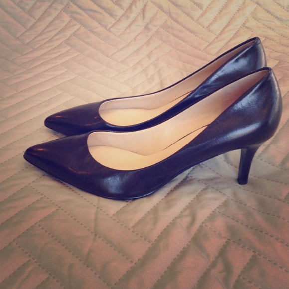 Black pumps. Size 9.5 W. 2.5" heal Nine West.