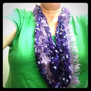 Hand-knitted purple infinity scarf