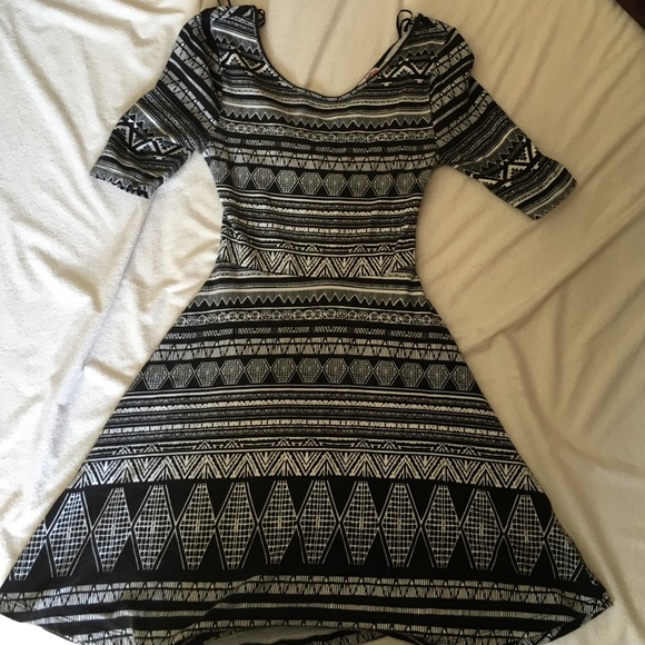 A Aztec printed dress worn once w/ a back cutout.