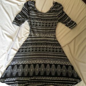 A Aztec printed dress worn once w/ a back cutout.