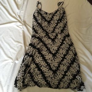 A floral print dress worn barley.