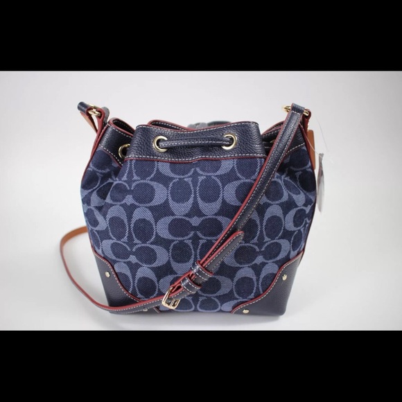 Coach bucket bag jeans.   New with tags