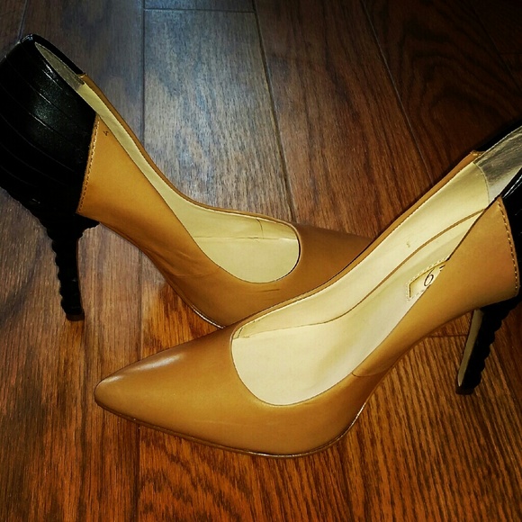 Neutral front.  Black back Boutique 9 Pumps