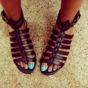 Black leather gladiator sandals