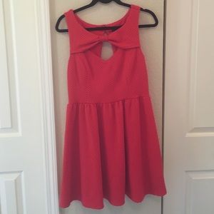 Red sweetheart dress with a bow accent