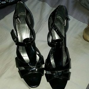 Black used heels, some visible wear
