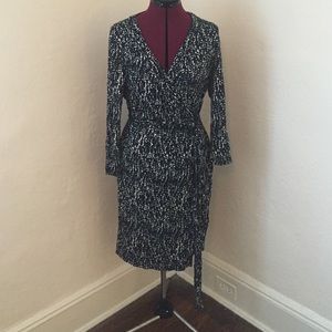 Blue and black print knit wrap dress
