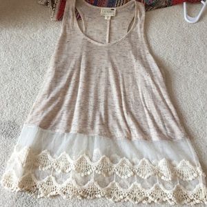 Tan color tank with lace on bottom