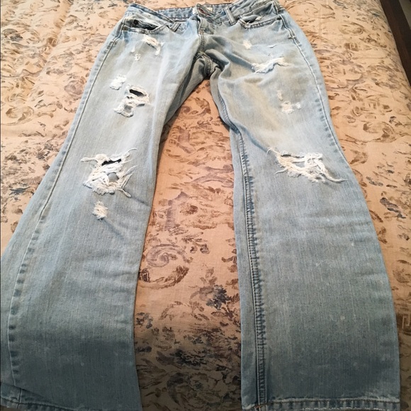 Distressed blue jeans