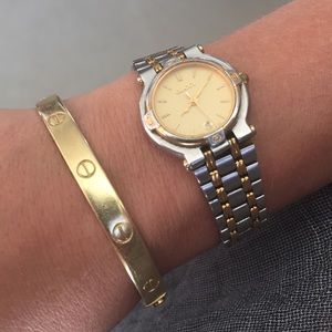 Vintage Authentic Gucci 9000L two-tone wristwatch.