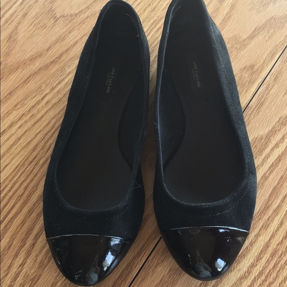 Black patent leather flats.
