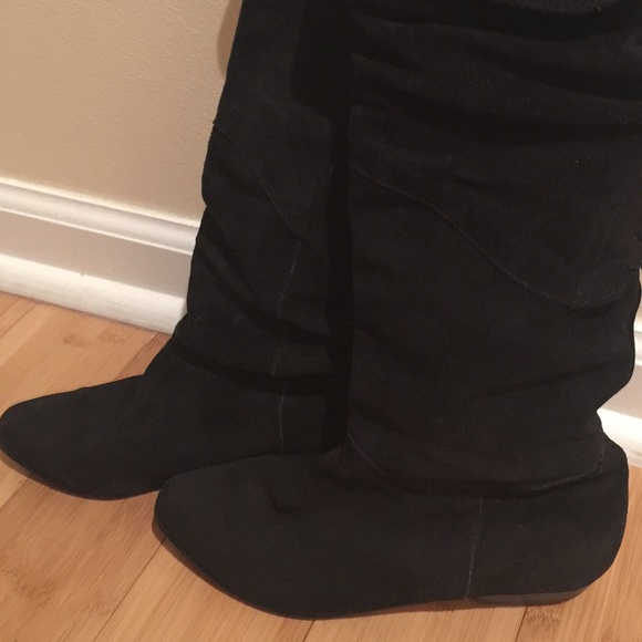 Black suede boots.