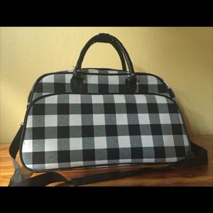Black and white plaid luggage bag