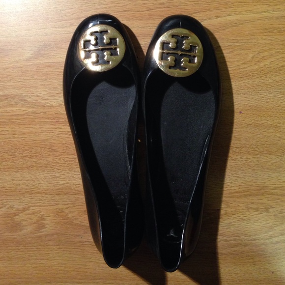 Tory Burch black jelly shoes with gold logo