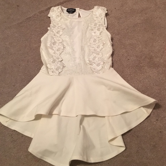 UNWORN BEBE PEPLUM TOP