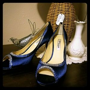 Royal blue bedazzled peep toe pumps