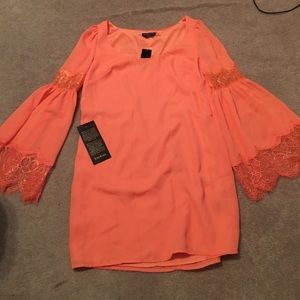 UNWORN BEBE ANGEL SLEEVE DRESS