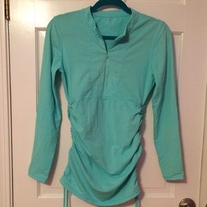 Athleta rash guard with adjustable side cinching