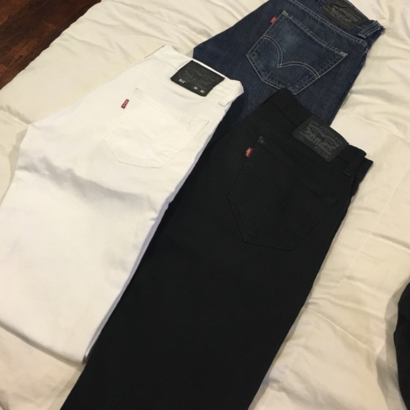 3 pairs of Levi jeans ( black, white, blue)