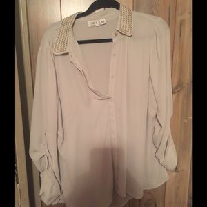 Tan Blouse With Gold Studs.