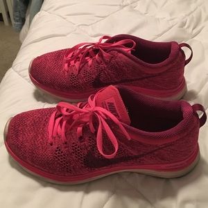 Nike Flyknit Lunar pink running shoes
