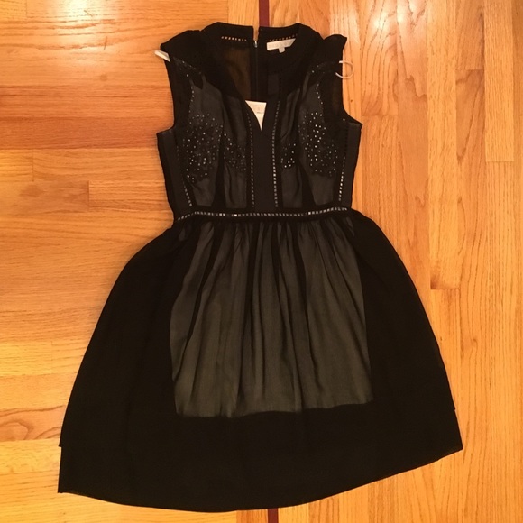 Black sheer dress with white slip