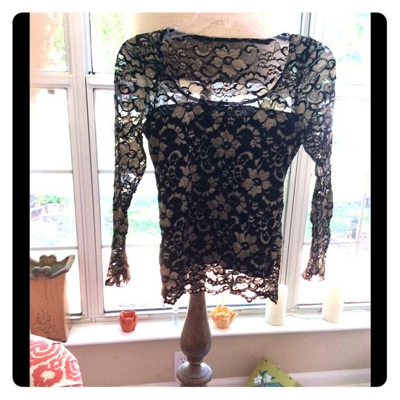Wheels Tops - Long sleeve black and beige knit top.