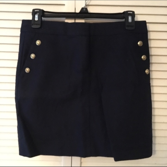 navy skirt with gold buttons