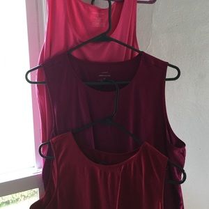 Three sleeveless shirts