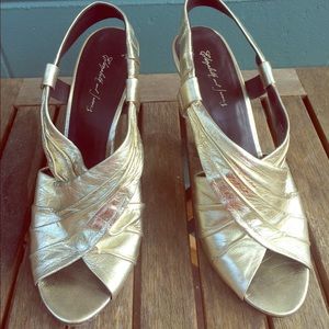 Gold peep toe wedge by Elizabeth and James