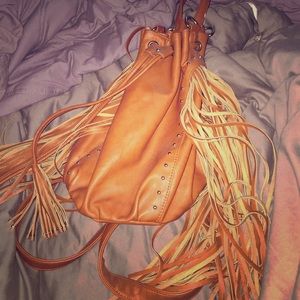 Free people vegan convertible fringe backpack