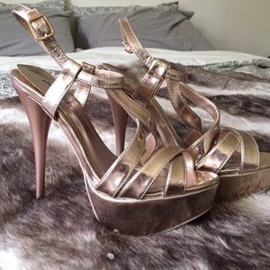 Rose gold platform pumps