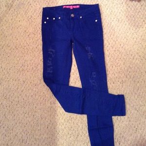 Blue ripped skinny jeans