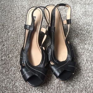Black leather wedges