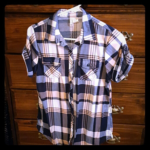 Blue and light peach plaid shirt.