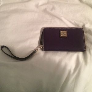 Never been used Dooney and Bourke wallet!
