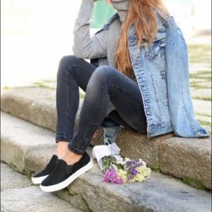 Black pony hair slip on