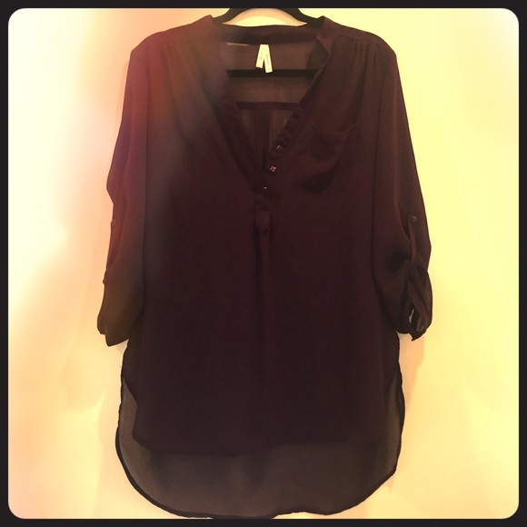 Sheer purple tunic.